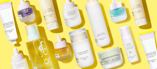 Image of Beekman 1802's Clinically Kind skincare items all laid next to each other on a yellow background.