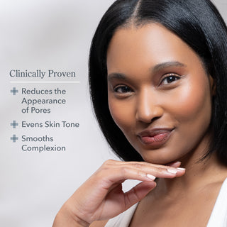 Infographic Image showing model smiling at the camera with the words "clinically proven to reduce the appearance of pores, evens skin tone, and smooths complexion" in a bulleted list to the left of her.