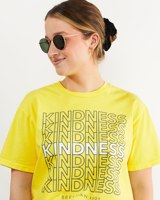 Model wearing Kindness Yellow T-Shirt 