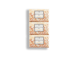 An image of Beekman 1802's Honey & Orange Blossom 3.5 oz 3-Pack Bar Soaps stacked on top of each other.