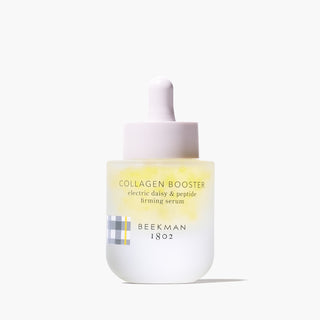 Bottle of Beekman 1802's Supersized Collagen Booster standing on a white background. 