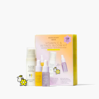 An image of the mini Bloom Cream, mini Golden Booster, mini Dream Booster, and Goatie pin next to the Vitamin C & Retinol Bloom Kit in the background.