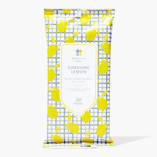 Pack of Beekman 1802's Sunshine Lemon 30 count face wipes in packaging covered in lemons, on a white background.