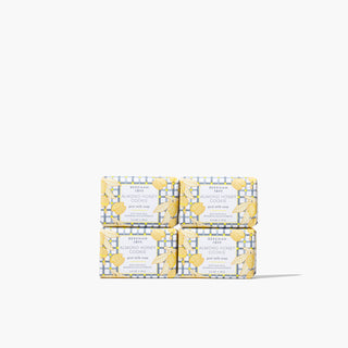 4 bars of Beekman 1802's Almond Honey Cookie palm-sized soaps stacked on top of each other in two's, on a white background.