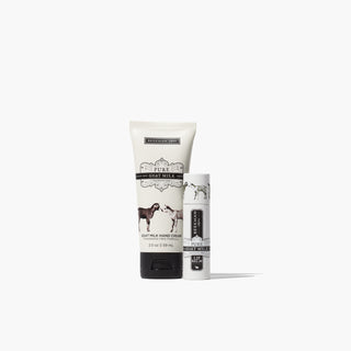 Tube of beekman 1802's pure goat milk fragrance free lip balm and hand cream standing next to each other on a white background. 
