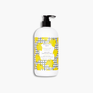 Bottle of Beekman 1802's Supersized Sunshine Lemon Hand & Body Wash, on a light gray background.