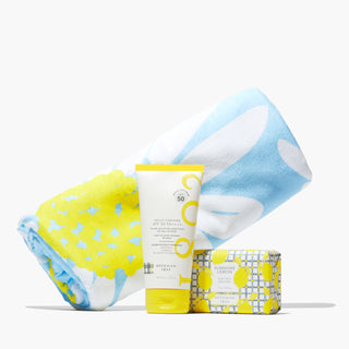 Summer Fun bundle including a beach towel, Hello Sunshine SPF 50 PA++++, and Sunshine Lemon Goat Milk Soap
