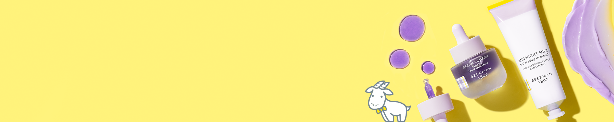 Bottle of Beekman 1802's Dream Booster Bakuchiol Serum and tube of Beekman 1802's Midnight Milk Sleep Mask on a yellow background to the right of the screen, surrounded by purple serum droplets from dropper that is spilling out, and purple mask texture smear, on a yellow background next to a white cartoon goatie.