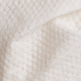 Up close shot of Beekman 1802's Glacial Mint & Eucalyptus Face Wipe towellete, showing the texture.