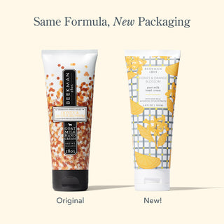 Side by side image of two of Beekman 1802's Honey & Orange Blossom Hand Creams, with the one on the left in the original packaging, and one on the right with the new packaging, with the words "same formula, new packaging," on top of the image.