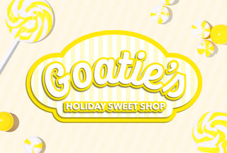 Graphic image of the words "Goatie's Holiday Sweet Shop" written in bubble letters on a yellow and white striped background, and the words surrounded by cartoon lollipops and candies, all colored white and yellow.