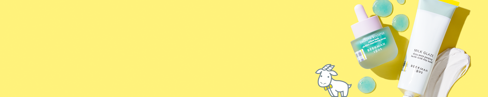 Bottle of Beekman 1802's Smoother Booster Willow Bark Resurfacing Serum and Tube of Beekman 1802's Milk Glaze Clay Mask surrounded by blue serum droplets and clay mask texture smear, on a yellow background to the far right of the screen, next to white cartoon goatie.   