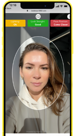 Woman situating her face in a circular area indicated to take a selfie and complete the first step of the Skin Biome Analysis