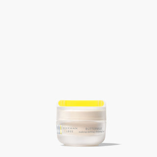 Buttermilk Makeup Melting Cleansing Balm on grey Background