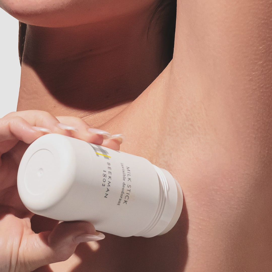 Up close video of model rubbing the beekman 1802 Milk stick Deodorant on their armpit. 