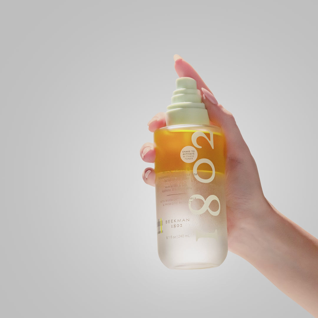 Video of hand shaking the Milk Shake and spraying it.